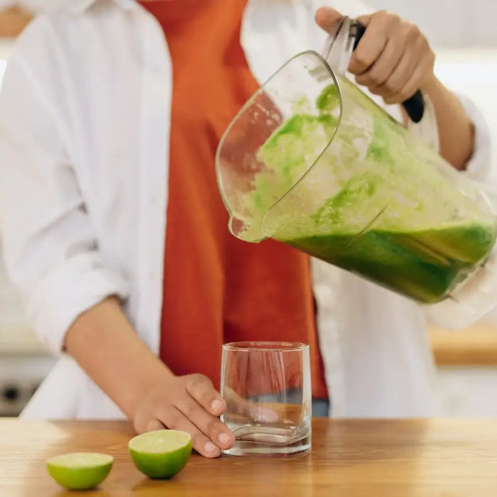 Pouring of Fruit Smoothie on Glass