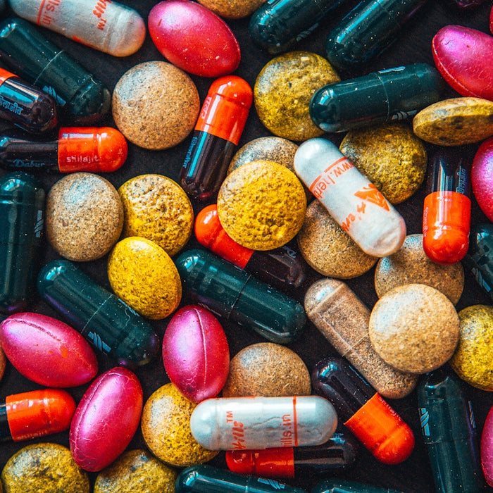 red and brown medication pill