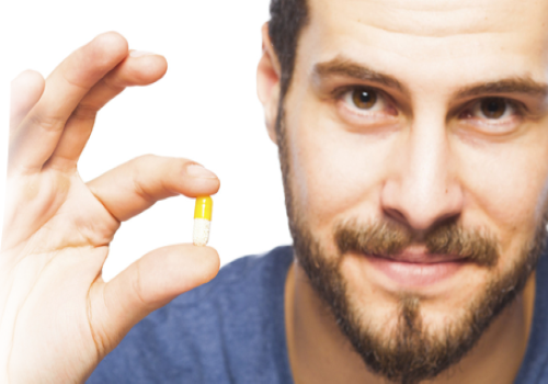 Man_holding_a_supplement